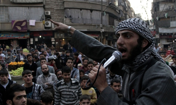 An ISIS member shouting at a crowd in Syria. This is copyright Karam al-Masri/AFP/Getty Images. I stole it from the Guardian article I wrote (see below for the link)